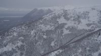 4K stock footage aerial video flying toward snowy mountains summit in the Chugach Mountains, Alaska Aerial Stock Footage | AK0001_1170