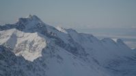 4K stock footage aerial video snowy Chugach Mountains, Knik Arm of the Cook inlet, Alaska Aerial Stock Footage | AK0001_1986