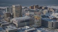 4K stock footage aerial videos tilting down on snow covered buildings in Downtown Anchorage, Alaska Aerial Stock Footage | AK0001_2014