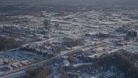 4K stock footage aerial video panning across snow covered residential neighborhoods, Anchorage, Alaska Aerial Stock Footage | AK0001_2025