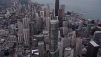 4.8K stock footage aerial video pass Trump Tower Chicago to approach John Hancock Center in Downtown Chicago, at sunset, Illinois Aerial Stock Footage | AX0003_049