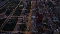 4.8K stock footage aerial video of a bird's eye of N Michigan Avenue between Grant Park and Downtown Chicago buildings, Illinois, twilight Aerial Stock Footage | AX0003_101