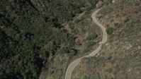 5K stock footage aerial video follow mountain road through San Gabriel Mountains in California Aerial Stock Footage | AX0005_009