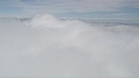 5K stock footage aerial video flyby a thick bank of clouds over Southern California Aerial Stock Footage | AX0010_081