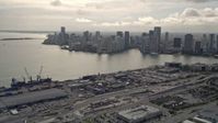 5K stock footage aerial video of Downtown Miami skyline seen from the Port of Miami, Florida Aerial Stock Footage | AX0021_077