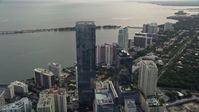 5K stock footage aerial video fly over bayfront skyscrapers to approach Four Seasons Hotel in Downtown Miami, Florida Aerial Stock Footage | AX0021_104E