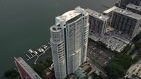 5K stock footage aerial video approach the Santa Maria waterfront high-rise in Downtown Miami, Florida Aerial Stock Footage | AX0021_107E
