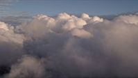 5K stock footage aerial video approach thick cloud cover at sunset over Miami, Florida Aerial Stock Footage | AX0022_003