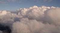 5K stock footage aerial video approach thick cloud formation over Miami at sunset, Florida Aerial Stock Footage | AX0022_008E