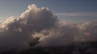 5K stock footage aerial video flyby a cloud formation at sunset over Miami, Florida Aerial Stock Footage | AX0022_017