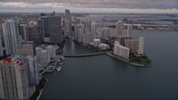 5K stock footage aerial video approach the bridge linking Downtown Miami with Brickell Key at sunset, Florida Aerial Stock Footage | AX0022_044E