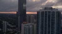 5K stock footage aerial video flyby Four Seasons Hotel and Jade at Brickell Bay in Downtown Miami at sunset, Florida Aerial Stock Footage | AX0022_059