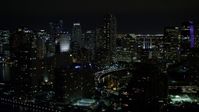 5K stock footage aerial video flyby skyscrapers on Brickell Key in Downtown Miami at night, Florida Aerial Stock Footage | AX0023_049E