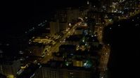 5K stock footage aerial video fly over Indian Creek Drive through Miami Beach at night, Florida Aerial Stock Footage | AX0023_102E