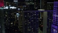 5K stock footage aerial video flyby Brickell on the River and 500 Brickell at night in Downtown Miami, Florida Aerial Stock Footage | AX0023_147E