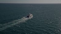 5K stock footage aerial video of tracking a yacht, Atlantic Ocean, Miami, Florida Aerial Stock Footage | AX0024_104