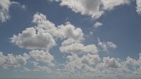 5K stock footage aerial video of approaching clouds above, Miami, Florida Aerial Stock Footage | AX0025_004