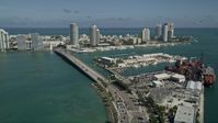5K stock footage aerial video of flying over MacArthur Causeway, revealing South Beach, Miami Beach, Florida Aerial Stock Footage | AX0031_046