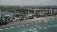 5K stock footage aerial video of flying by the beach, Hollywood, Florida Aerial Stock Footage | AX0031_093