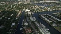 5K stock footage aerial video of flying by residential neighborhoods and canals, Fort Lauderdale, Florida Aerial Stock Footage | AX0031_133