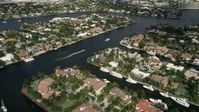 5K stock footage aerial video of flying over upscale homes on canals, Fort Lauderdale, Florida Aerial Stock Footage | AX0031_134