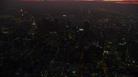 7.6K stock footage aerial video flying over Downtown Los Angeles skyscrapers at sunrise, California Aerial Stock Footage | AX0156_035