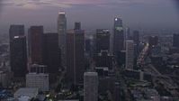 7.6K stock footage aerial video of skyscrapers around the Westin Bonaventure Hotel in Downtown Los Angeles, California early in the morning Aerial Stock Footage | AX0156_069