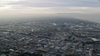 7.6K stock footage aerial video of an oil refinery in El Segundo, California, sunrise Aerial Stock Footage | AX0156_195