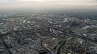7.6K stock footage aerial video flying by an oil refinery in El Segundo, California, sunrise Aerial Stock Footage | AX0156_196