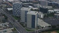 7.6K stock footage aerial video flying past office buildings in El Segundo, California in the morning  Aerial Stock Footage | AX0156_198