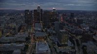 7.6K stock footage aerial video of skyscrapers, Dorothy Chandler Pavilion, and 110 at twilight in Downtown Los Angeles, California Aerial Stock Footage | AX0158_050