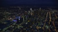 7.6K stock footage aerial video of a wide view of skyscrapers at night in Downtown Los Angeles, California Aerial Stock Footage | AX0158_082