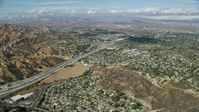 7.6K stock footage aerial video flying over suburban neighborhoods along I-5, Santa Clarita, California Aerial Stock Footage | AX0159_012