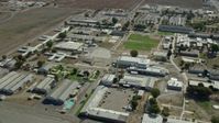 7.6K stock footage aerial video flying by the California Institution for Men in Chino, California Aerial Stock Footage | AX0159_146