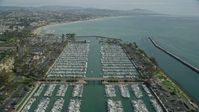 7.6K stock footage aerial video flying over boats docked at Dana Point Harbor in Dana Point, California Aerial Stock Footage | AX0159_193