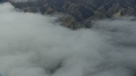 7.6K stock footage aerial video of low clouds over Avalon, Catalina Island, California Aerial Stock Footage | AX0159_249