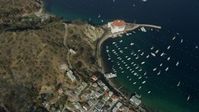 7.6K stock footage aerial video of a bird's eye view of boats in the harbor in Avalon, Catalina Island, California Aerial Stock Footage | AX0159_252