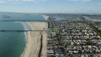 7.6K stock footage aerial video of coastal neighborhoods around an inlet and Alamitos Bay in Long Beach, California Aerial Stock Footage | AX0160_055