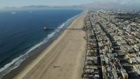 7.6K stock footage aerial video of Manhattan Beach Pier seen while flying over beachside neighborhoods in Manhattan Beach, California Aerial Stock Footage | AX0161_040