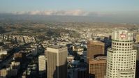 7.6K stock footage aerial video flying US Bank Tower and over Bank of America Center in Downtown Los Angeles, California Aerial Stock Footage | AX0162_020