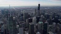 4K stock footage aerial video of flying over the city's skyscrapers, toward Willis Tower in Downtown Chicago, Illinois Aerial Stock Footage | AX0165_0058
