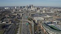 6.7K stock footage aerial video follow freeway with heavy traffic toward the Downtown Atlanta skyline, Georgia Aerial Stock Footage | AX0171_0072