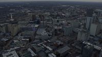 6.7K stock footage aerial video of tilting from freeway to reveal and approach the Georgia State Capitol in Downtown Atlanta at sunset Aerial Stock Footage | AX0171_0156