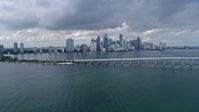 6.7K stock footage aerial video flyby the Rickenbacker Causeway with a view of Downtown Miami skyline, Florida Aerial Stock Footage | AX0172_016