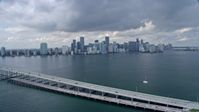 6.7K stock footage aerial video of a view of Downtown Miami skyline, seen from Rickenbacker Causeway, Florida Aerial Stock Footage | AX0172_017