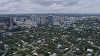 6.7K stock footage aerial video tilt from bird's eye view of waterfront homes to reveal Downtown Fort Lauderdale, Florida Aerial Stock Footage | AX0172_045