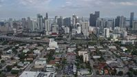 6.7K stock footage aerial video a reverse view of skyscrapers and city buildings in Downtown Miami, Florida Aerial Stock Footage | AX0172_103
