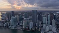 6.7K stock footage aerial video flyby skyscrapers and reveal the river in Downtown Miami, Florida at sunset Aerial Stock Footage | AX0172_172