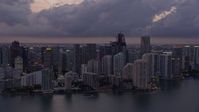 6.7K stock footage aerial video of Brickell Key and Downtown Miami skyscrapers at twilight, Florida Aerial Stock Footage | AX0172_208
