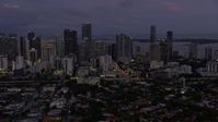 6.7K stock footage aerial video of flying past Downtown Miami skyscrapers at twilight, Florida Aerial Stock Footage | AX0172_211